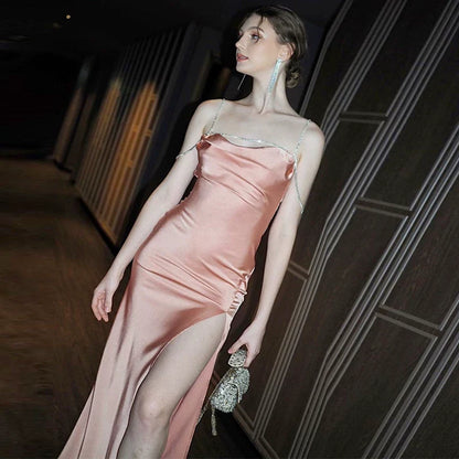 Sexy one-shoulder backless tie-wrapped halter dress with high waistline, showing off the figure, side slit, knee-length long skirt